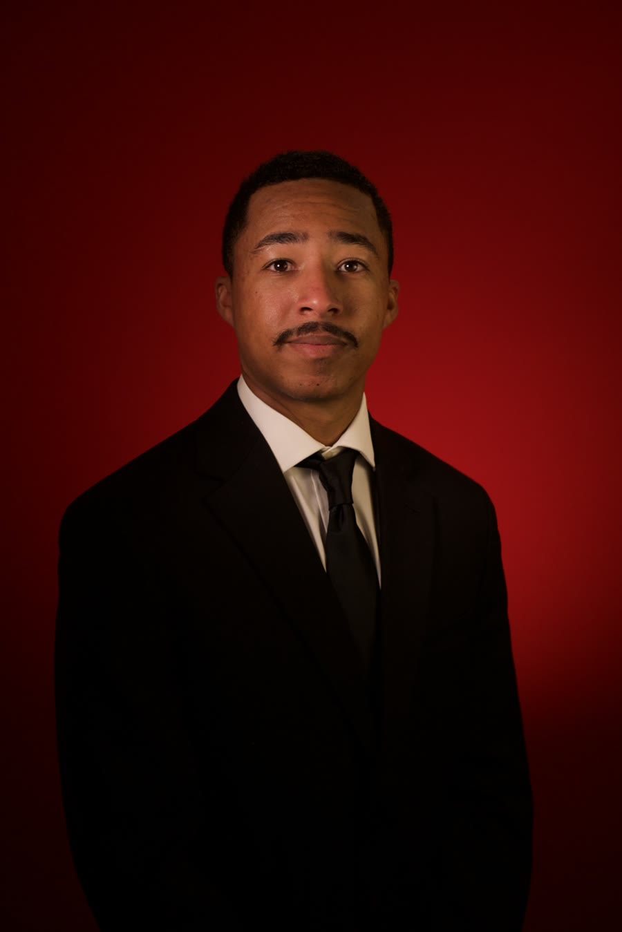 Studio portrait of James Makawa